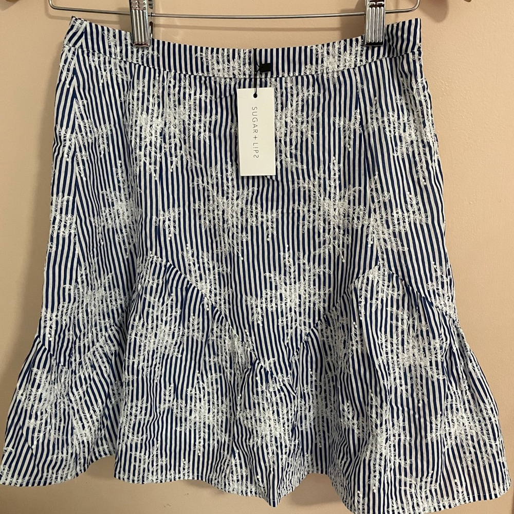 Brand new sugar-lips skirt with lace detail